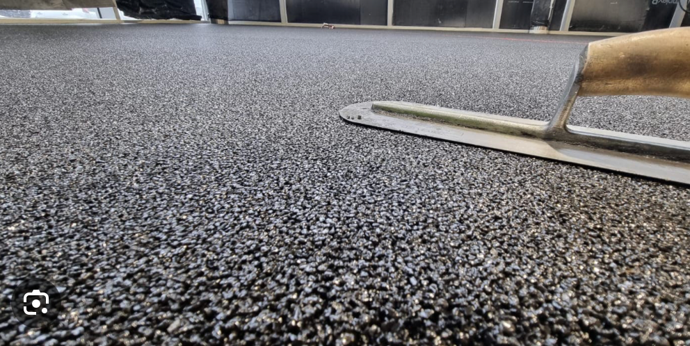 Resin Bound Stone Carpet Installation — Trowel Finish